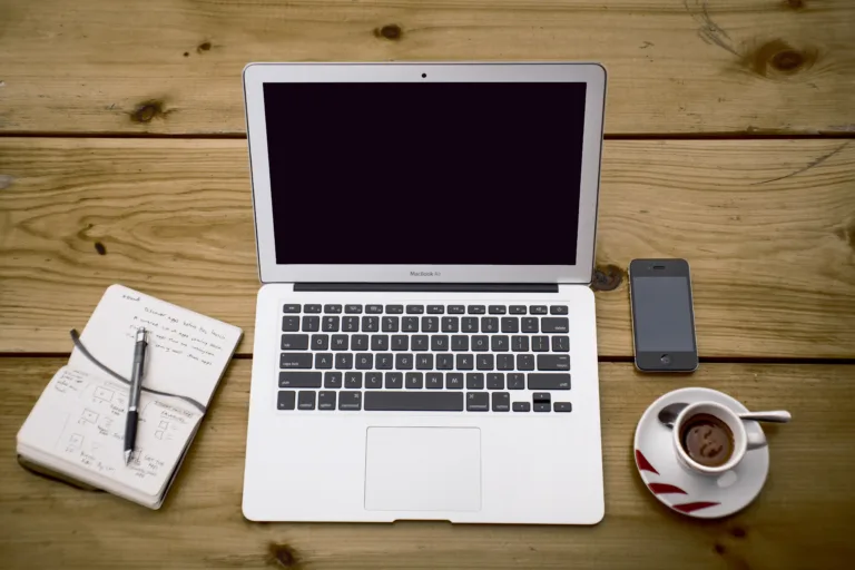 Iphone macbook and smartphone on a table Unsplash 1